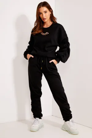Kyra Black Ruched Chain Detail Jumper and Joggers Tracksuit Set